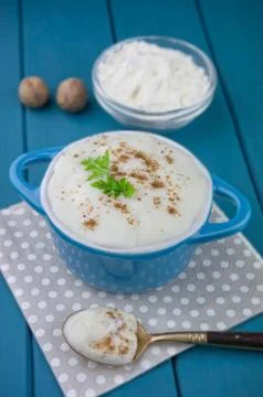Bechamel sauce on kitchen table Stock Photos
