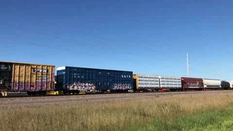BECKER, MN  31 AUG 2022: Speeding freight train. Stock Footage 219692363