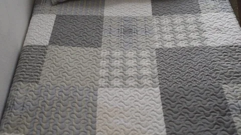 Bed and cushion in gray and white colors. Видео 90478243