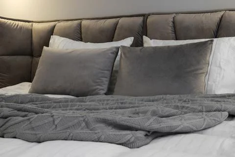 Bed close up with pillows Fotos Stock