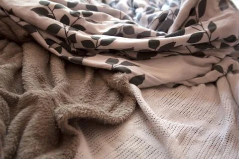 Bed clothes textured background Stock Photos