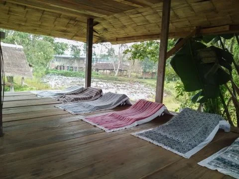 A bed in the cottage Stock Photos