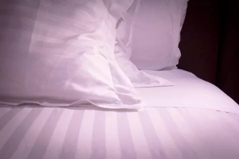 Bed down comforter feather pillows Foto stock