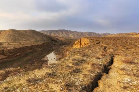 The bed of a dried-up river in the mountains Stock Photos