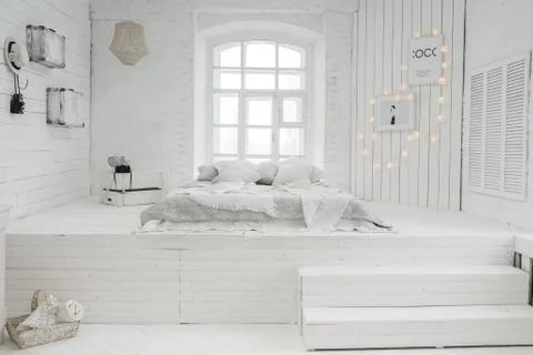 Bed on the floor. Modern Studio design Stock-Fotos