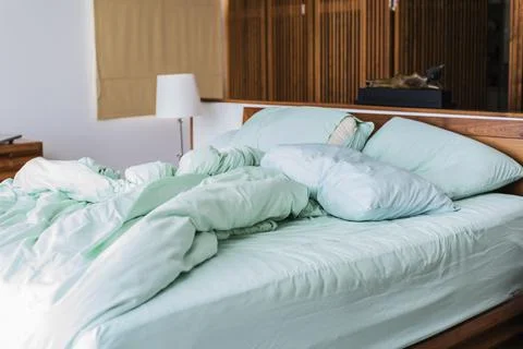 Bed at home bedroom Stock Photos