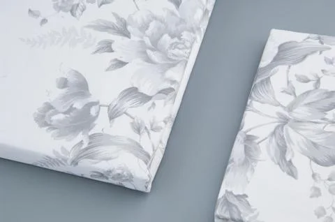 Bed linen on grey background Stock Photos