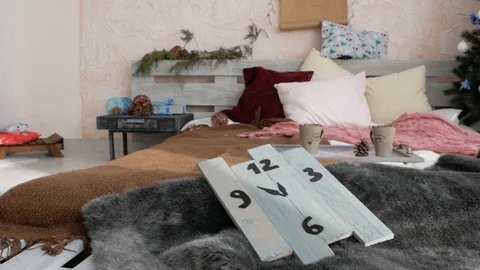 Bed near the New Year tree Stock Footage 98991554