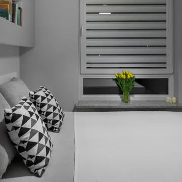 Bed near window Stock Photos