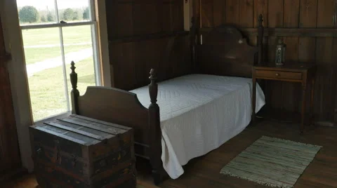 Bed in Old Cabin with Light Going Through Window, 4K Stock-Footage 61518482