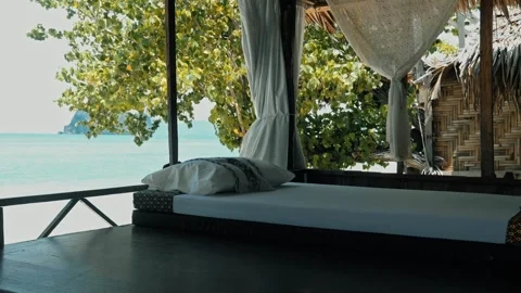 Bed overlooking tropical ocean view 스톡 동영상 342337794