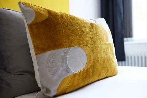 Bed, pillow closeup and interior of hotel room with hospitality, accommodation Stock Photos