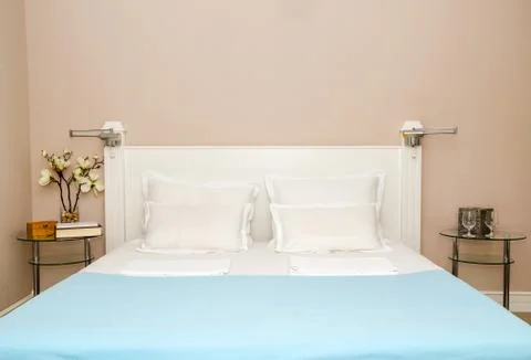 Bed, pillows, sheets, blanket Stock Photos