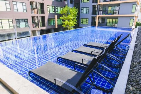 Bed in the pool. Stock Photos