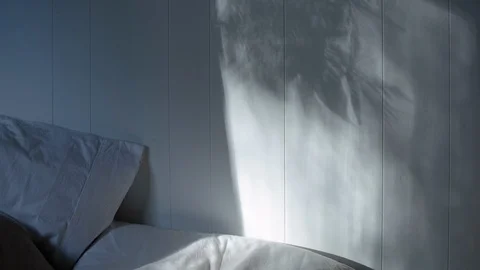 Bed sheet and pillow on bed in bedroom Vidéo 94884131