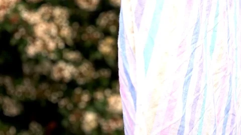 Bed sheet on washing line Stock Footage 101730389