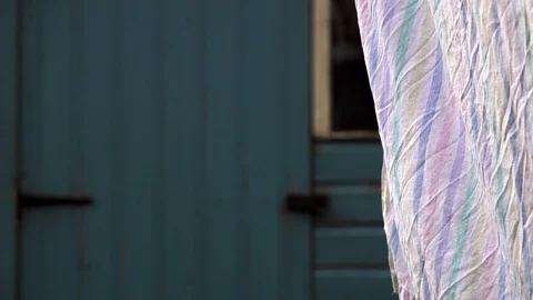 Bed sheet on washing line Stock Footage 101781661