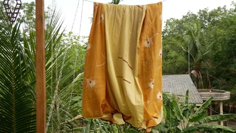 Bed sheets hanging, laundry blowing on the washing line. Stock Footage 255003223