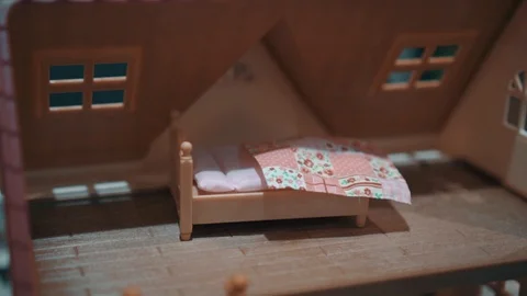 Bed in a toy House Stock Footage 100558611