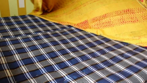Bedding with Plaid and Colorful Textiles Stock Footage 325468906