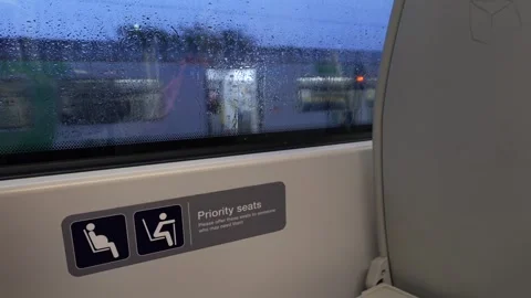 Bedford to London Train pulling out of station from the inside Video stock 317453885