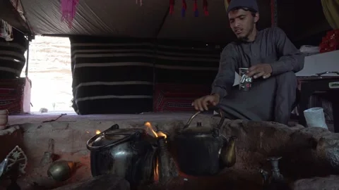 Bedouin serving tea to visitors in Wadi Rum desert in Jordan Stock Footage 171759829