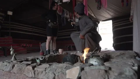Bedouin serving tea to visitors in Wadi Rum desert in Jordan Stock Footage 171759834