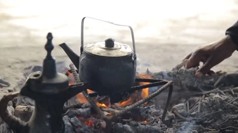 Bedouins Making Tea in a Kattle on a Bonfire Stock Footage 52703122