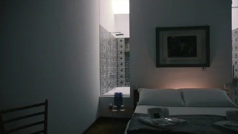 Bedroom with background bathroom Stock Footage 86171811