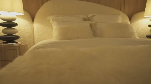 Bedroom with bed, bedside table and lamp in modern style Stock Footage 273142299