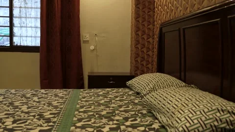 Bedroom bed by window Stock Footage 331831831