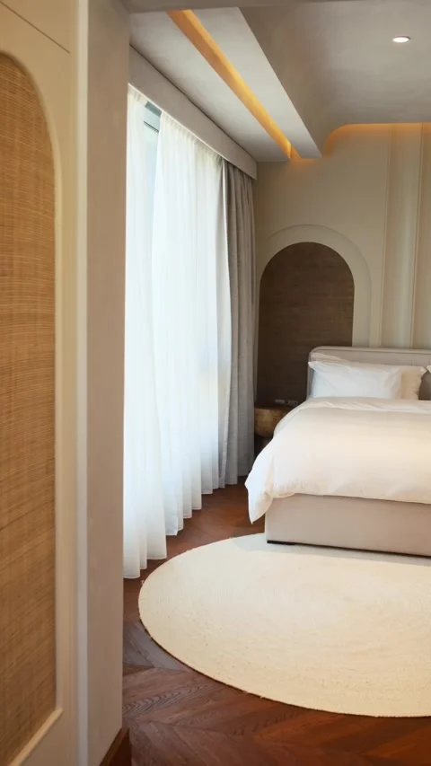 Bedroom in a chic expensive villa in Dubai, illuminated by sunlight Stock Footage 280298853