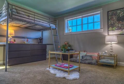 Bedroom decor with bunk bed and futon Stock Photos