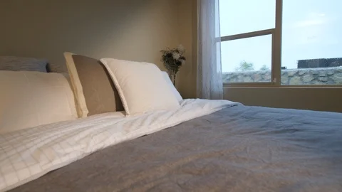 Bedroom Detail Pan Left Down to End Table Stock Footage 112890878