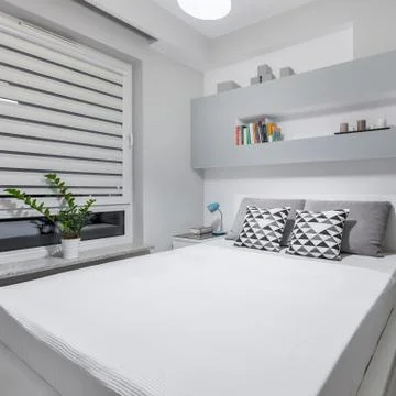 Bedroom with double bed Stock Photos