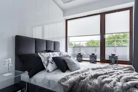 Bedroom with double bed Stock Photos