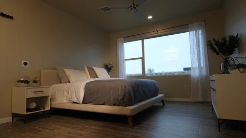 Bedroom Dramatic Lighting Rise and Tilt Down 스톡 동영상 112890807