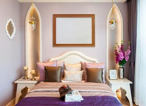 Bedroom with empty frame Stock Photos