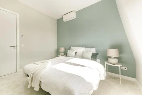 Bedroom interior with comfortable bed Stock Photos