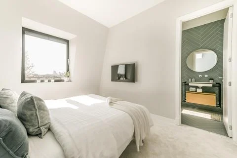Bedroom interior with comfortable bed Stock Photos