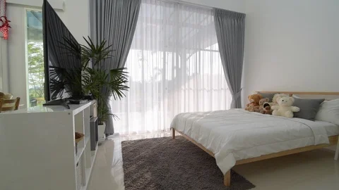 Bedroom interior design with big window. Stockbeeldmateriaal 87674319