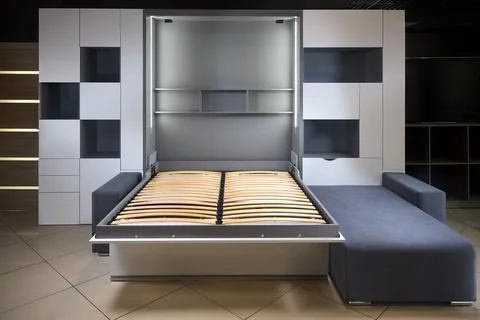 Bedroom interior flat with Vertical Murphy Wall Bed, roll-away pull out bed Stock Photos