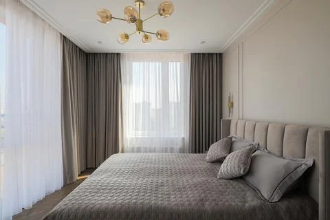 Bedroom interior with large bed Photos
