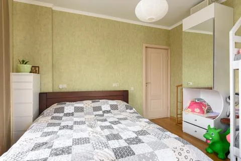 Bedroom interior with a large double bed Stock-Fotos
