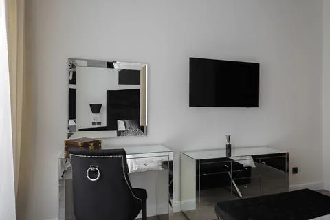 Bedroom interior with mirrored dressing table Stock Photos