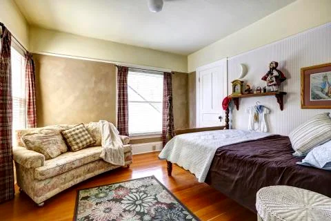 Bedroom interior in old house Stock Photos