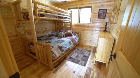 Bedroom in a log cabin Stock Footage 103954614