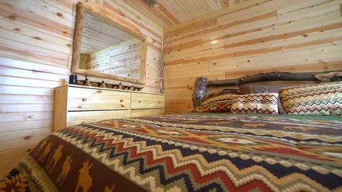Bedroom in a log cabin Stock Footage 103954698