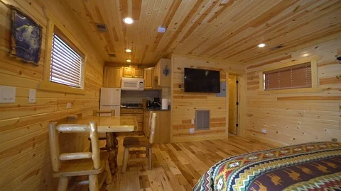 Bedroom in a log cabin Stock Footage 103954700