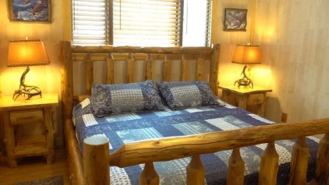 Bedroom in a log cabin Stock Footage 103955017